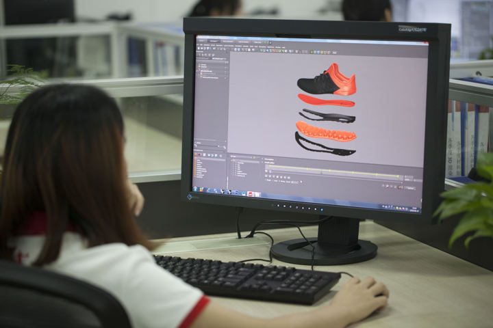 Designer is working on 3D model of the sneaker